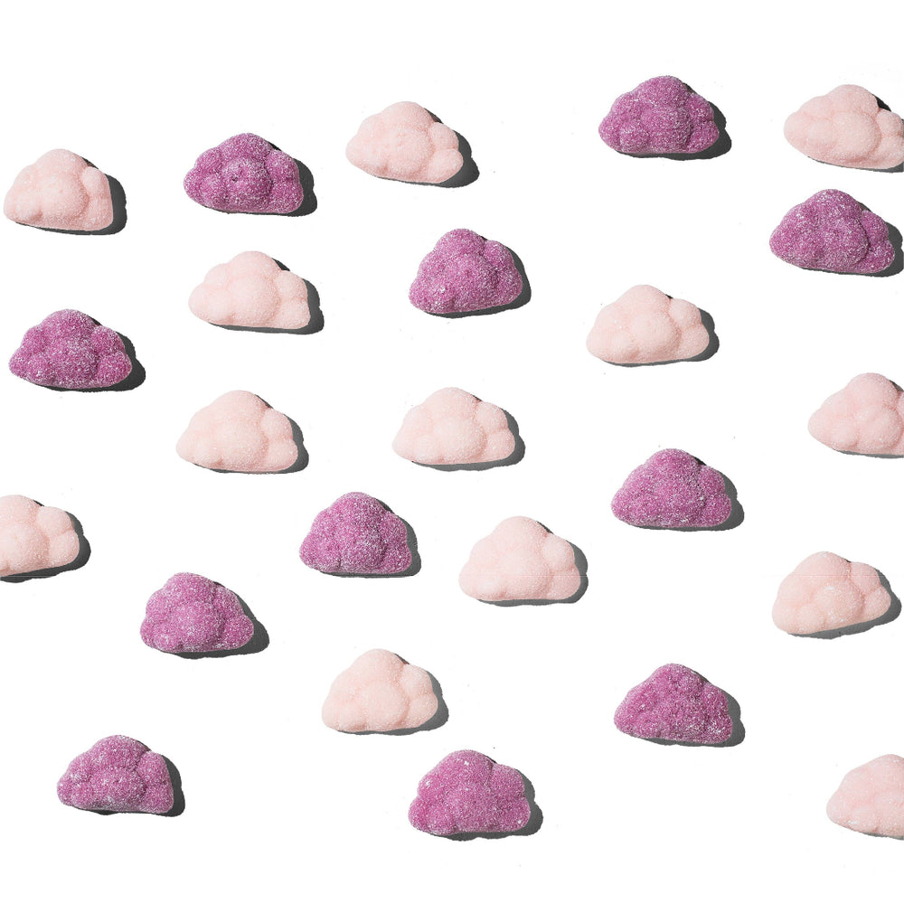 Pattern of pink and purple rocks on a white background