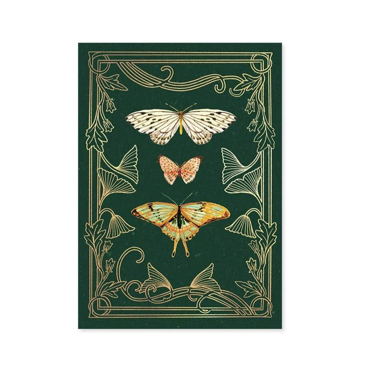 A saturated green card with a gold foil plant pattern border and watercolor moths/butterflies.