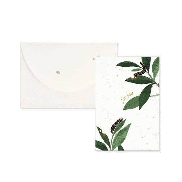 Front of the card is white with gold speckles and has two branches of greenery with caterpillars.