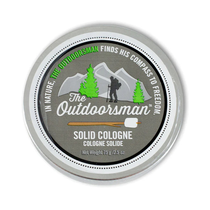 Walton Wood Farm | A round metal tin of solid cologne. "InNature, the outdoorsman finds his compass to freedom. The Outdoorsman, solid cologne, cologne, solide, net weight 75 g / 2.5 oz."