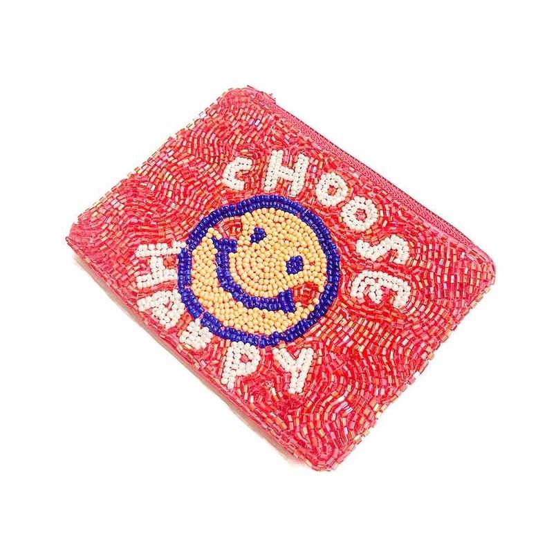 Out and about seed bead coin purse with pink beaded background and a yellow smiley face. Text reads: Choose Happy.