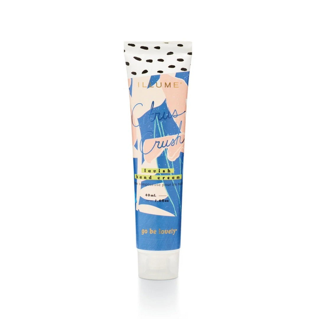 Go Be Lovely Hand Cream | Citrus Crush, lavish hand cream, 40ml, 1.4 fl oz, the packaging is decorated with blue and pink in and abstract floral pattern.