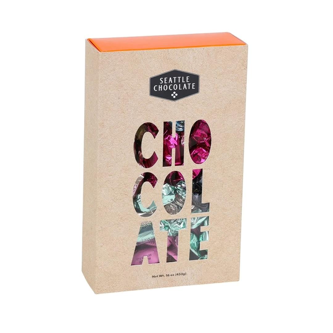 Seattle Chocolate | Color of Chocolate Gift Box | A brown box with transparent letters that reveal the chocolates on the interior.