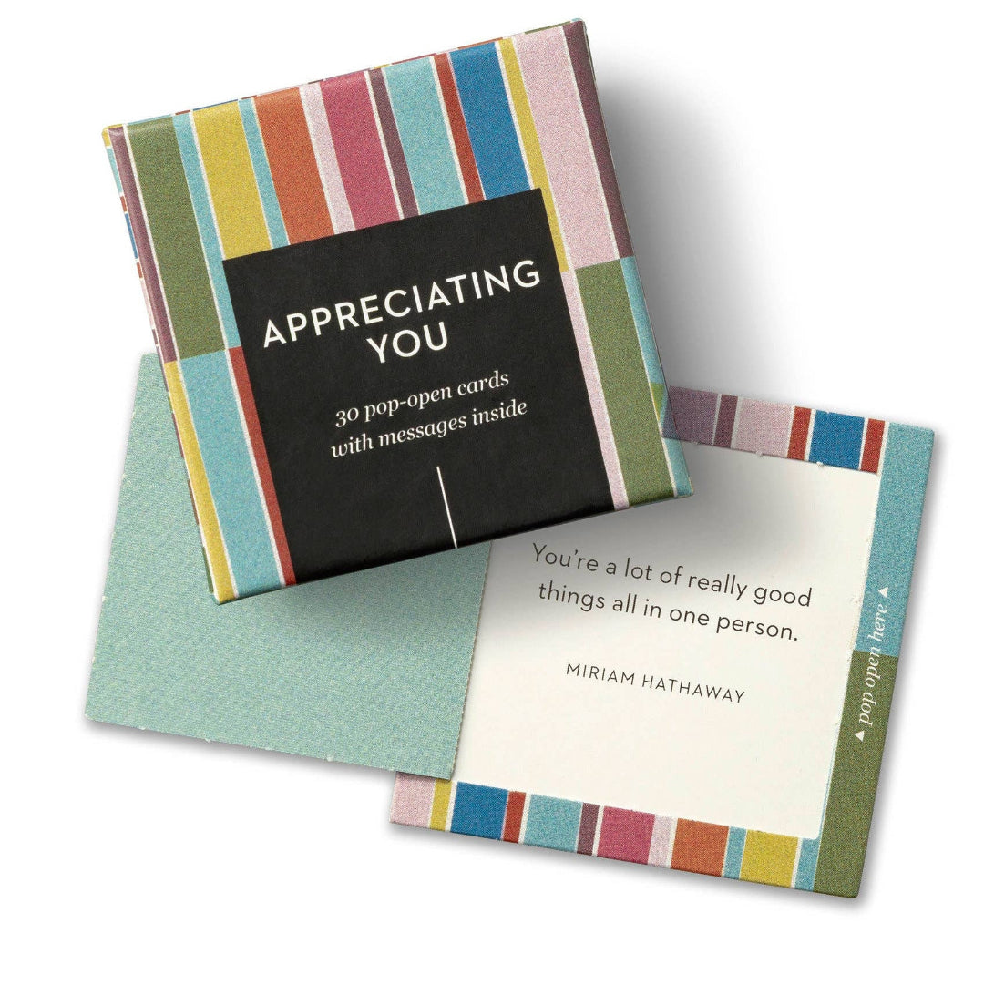 Set of colorful pop-open cards with a card displayed on a white background