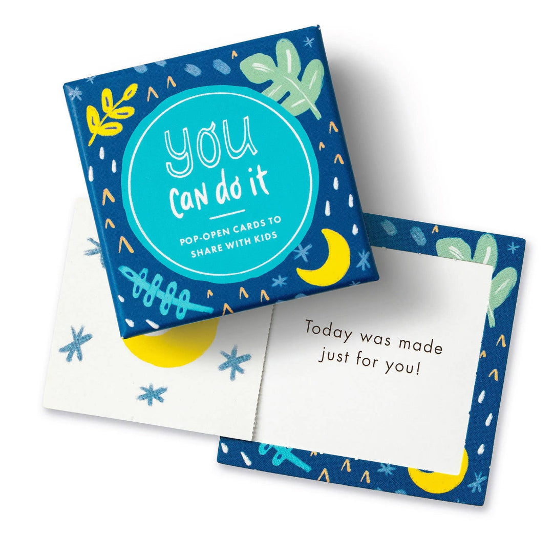 Pop-open card with motivational message and colorful design on a white background