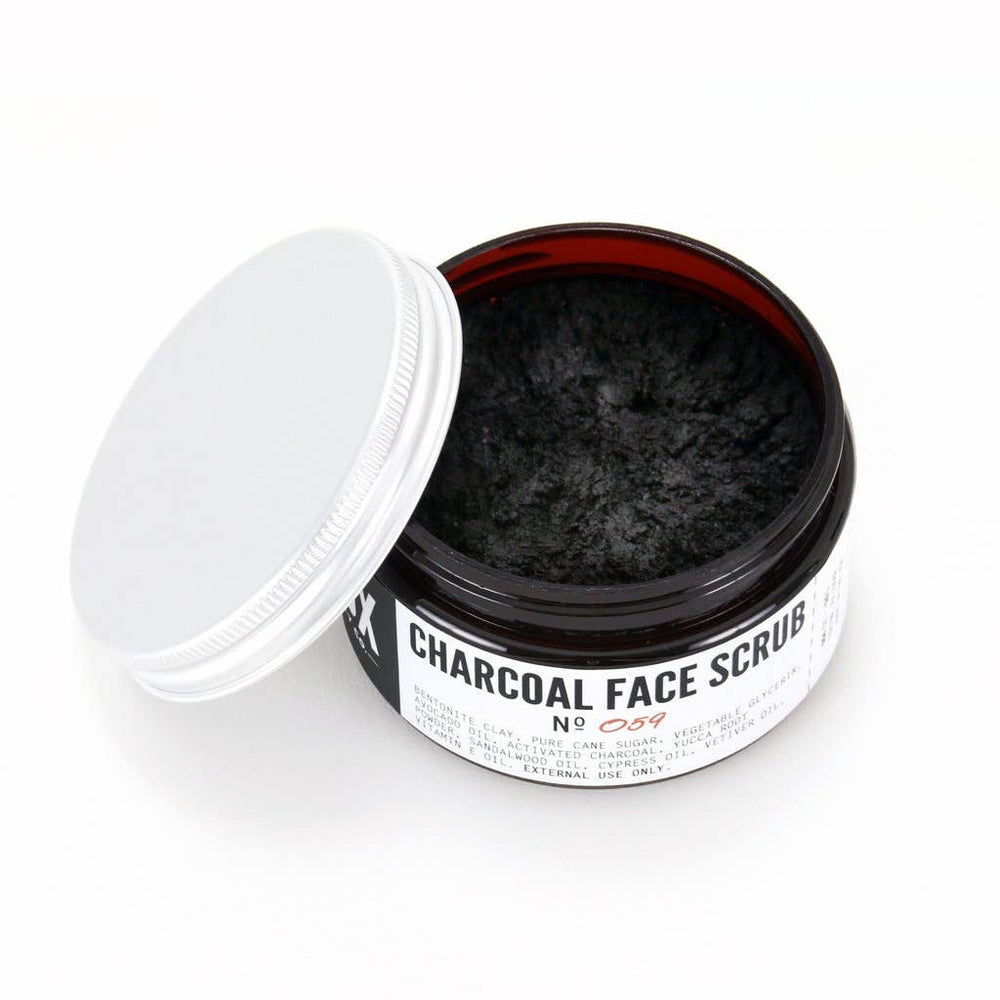 Crux | Charcoal Face Scrub no. 059 | Open container showing the charcoal face scrub on the interior.