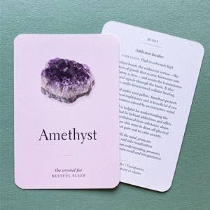 Amethyst crystal card with text on a green background