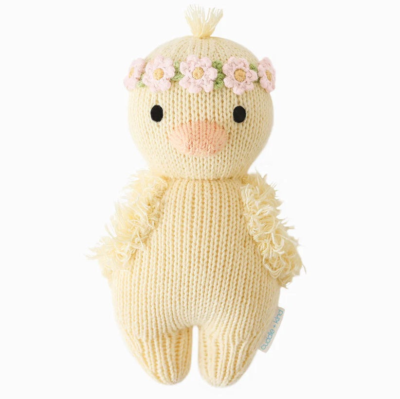 Cuddle + Kind | hand knit baby duckling with a pink flower crown.