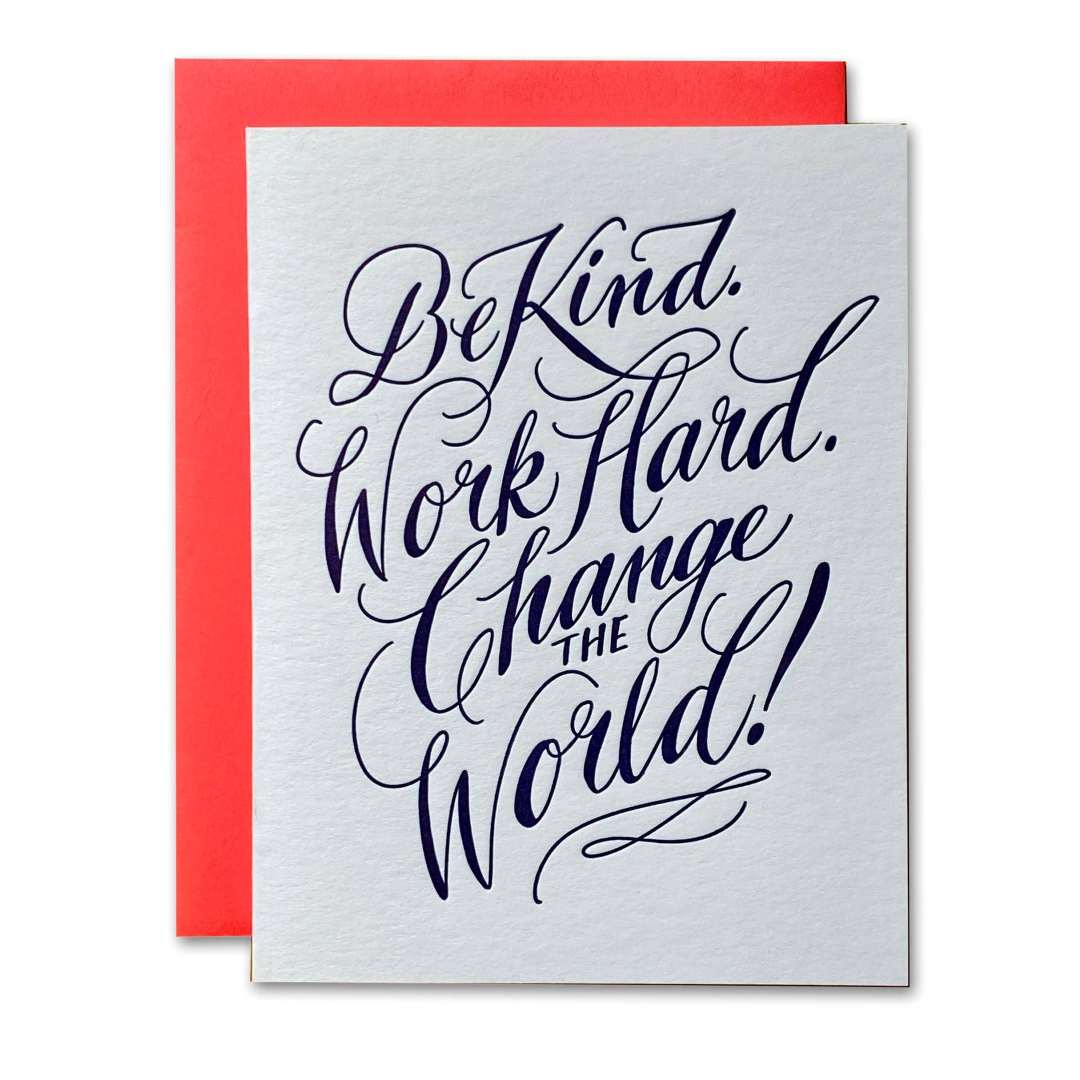 Dahlia Press | Motivational card with text 'Be Kind. Work Hard. Change The World!' on a gray background with a red envelope.