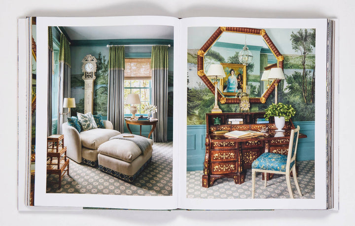Open book showing interior design images of a living room and a desk.