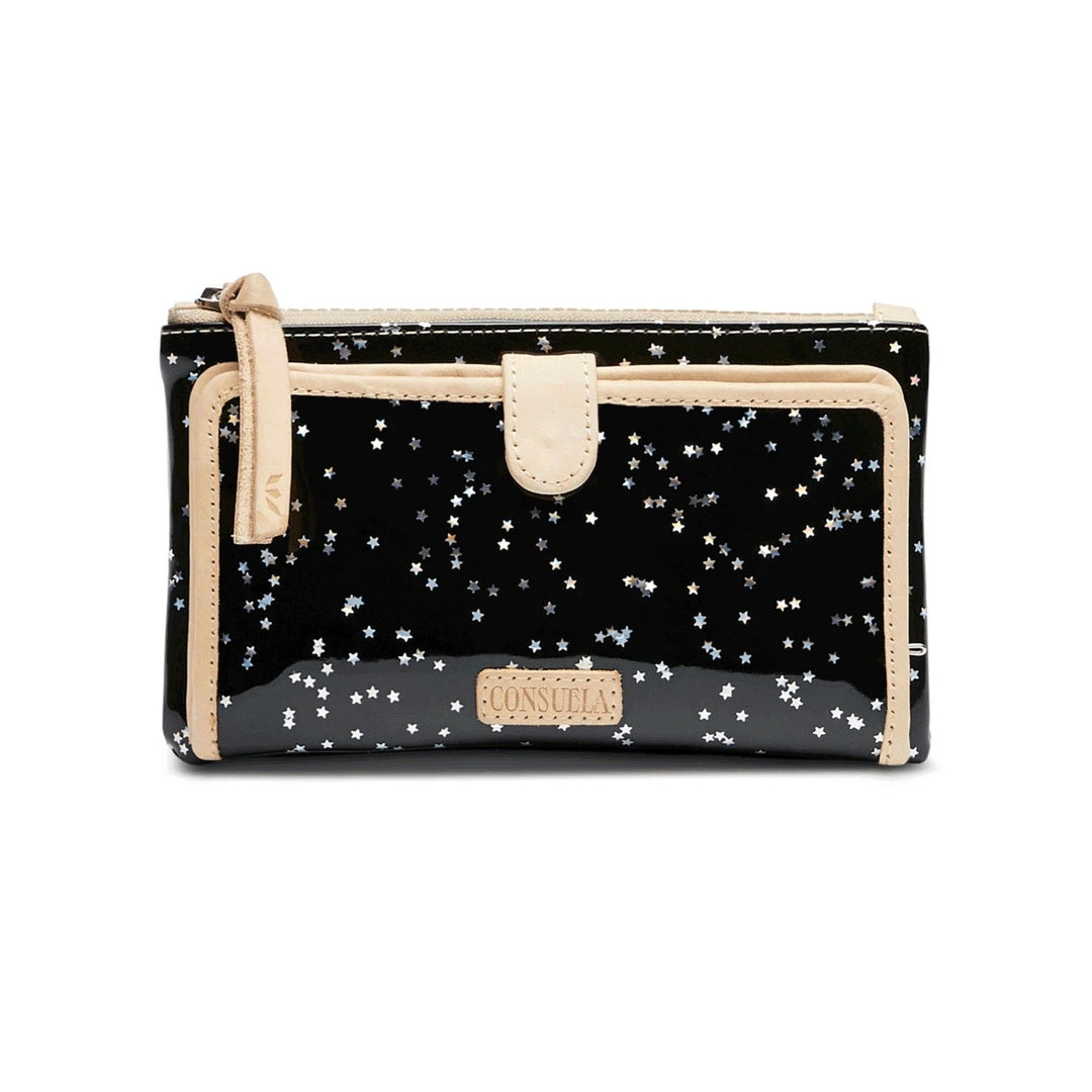 Dreamy Slim Wallet | Consuela | A black wallet with tiny reflective silver stars, accented with natural leather trim.
