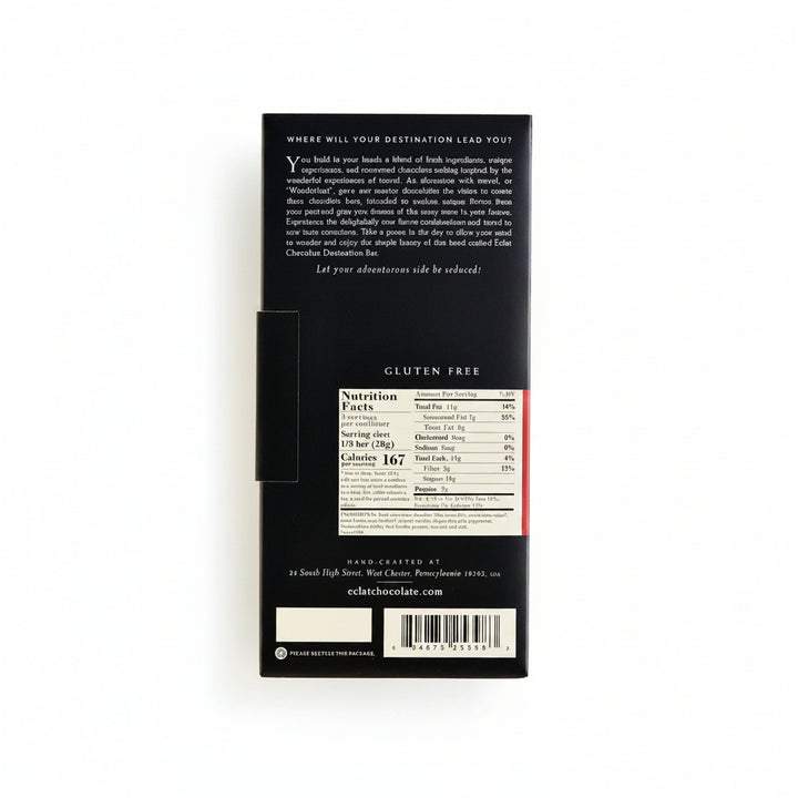 Back view of a dark chocolate bar package showing product description text, a nutrition facts panel, and a barcode on a white background.