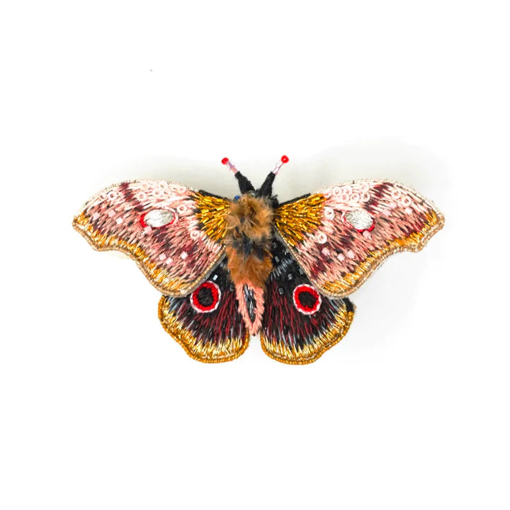 Emperor Mopane Moth | Trovelore | Emperor Mopane Moth, white, red, gold, pink, and brown.