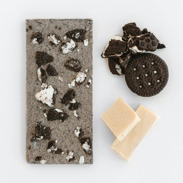 Oreo-themed soap bar with Oreo cookies and cream on a white background