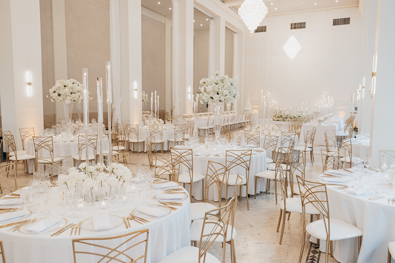 Arbor Midtown | TPI Photography | Reception hall full of white linen, candles, and centerpieces of white roses, baby's breath, and hydrangea.