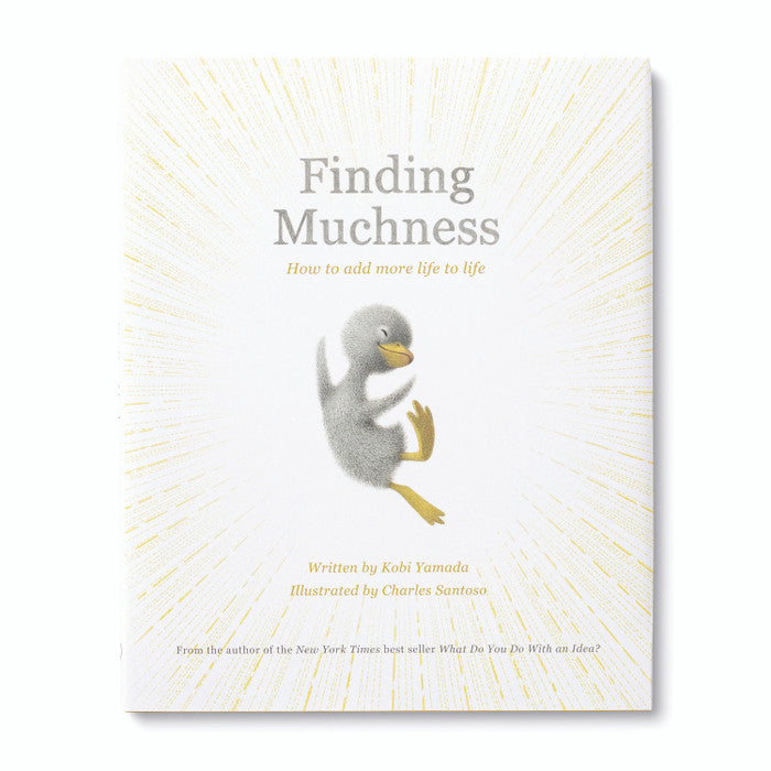 Compendium | "Finding Muchness" Book | A white and yellow book with a baby duck jumping in the air. Text "Finding Muchness, How to add more life to life. Written by Kobi Yamada, illustrated by Charles Santoso, From the author of the New York Times best seller What do You Do With and Idea?".