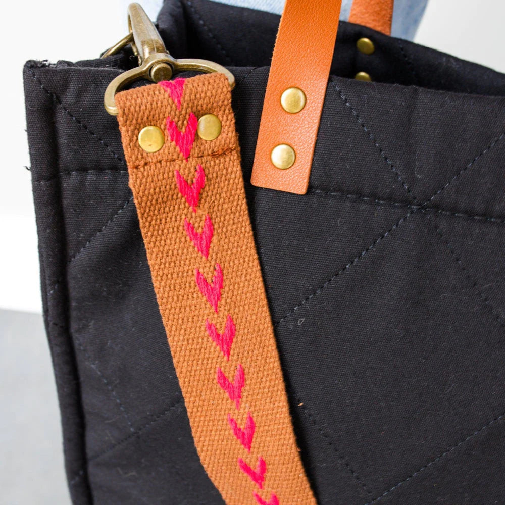 Canvas Bag Strap | Pretty Simple | Replacement Crossbody strap. brown with pink arrows (shaped like hearts) leading down the strap.