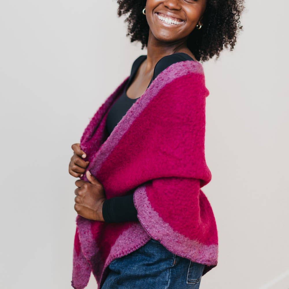 Model showing of her bright pink scarf