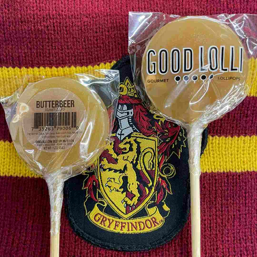 Good Lolli | Butterbeer LOLLIPOP | Butterbeer lollipops on a harry potter gryffindor logo.