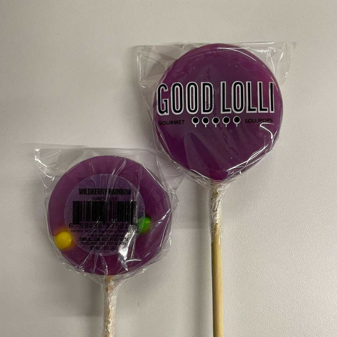 Good Lolli | WILDBERRY RAINBOW LOLLIPOP | A purple lollipop with colorful candies on the interior.