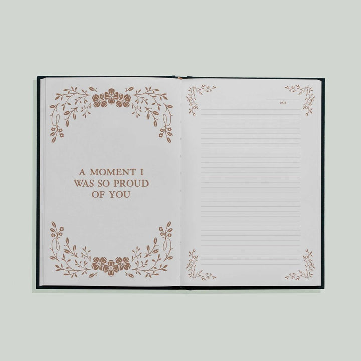 Paige Tate & Co. | Grateful For You | A gratitude journal for parents to preserve memories and special moments. "A moment I was so proud of you" text on a page next to a lined page.