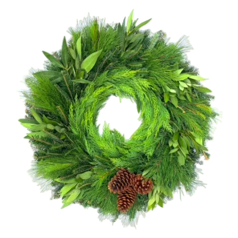 A round wreath made of green cedar, white pine, and bay laurel accented with pine cones.