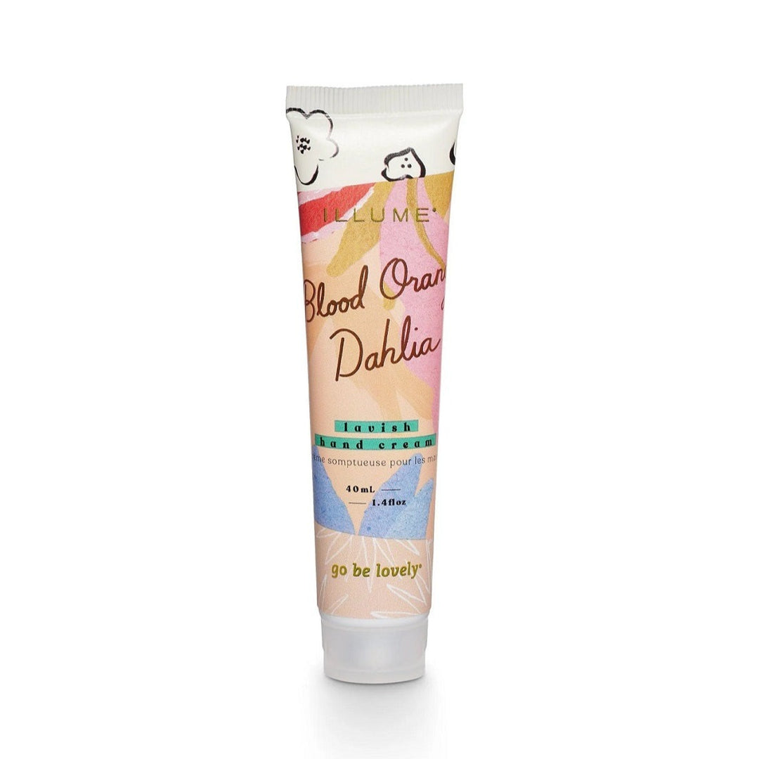 Go Be Lovely Hand Cream | Blood orange dahlia, lavish hand cream, 40ml, 1.4 fl oz. A squeeze bottle decorated with an abstract colorful floral pattern.