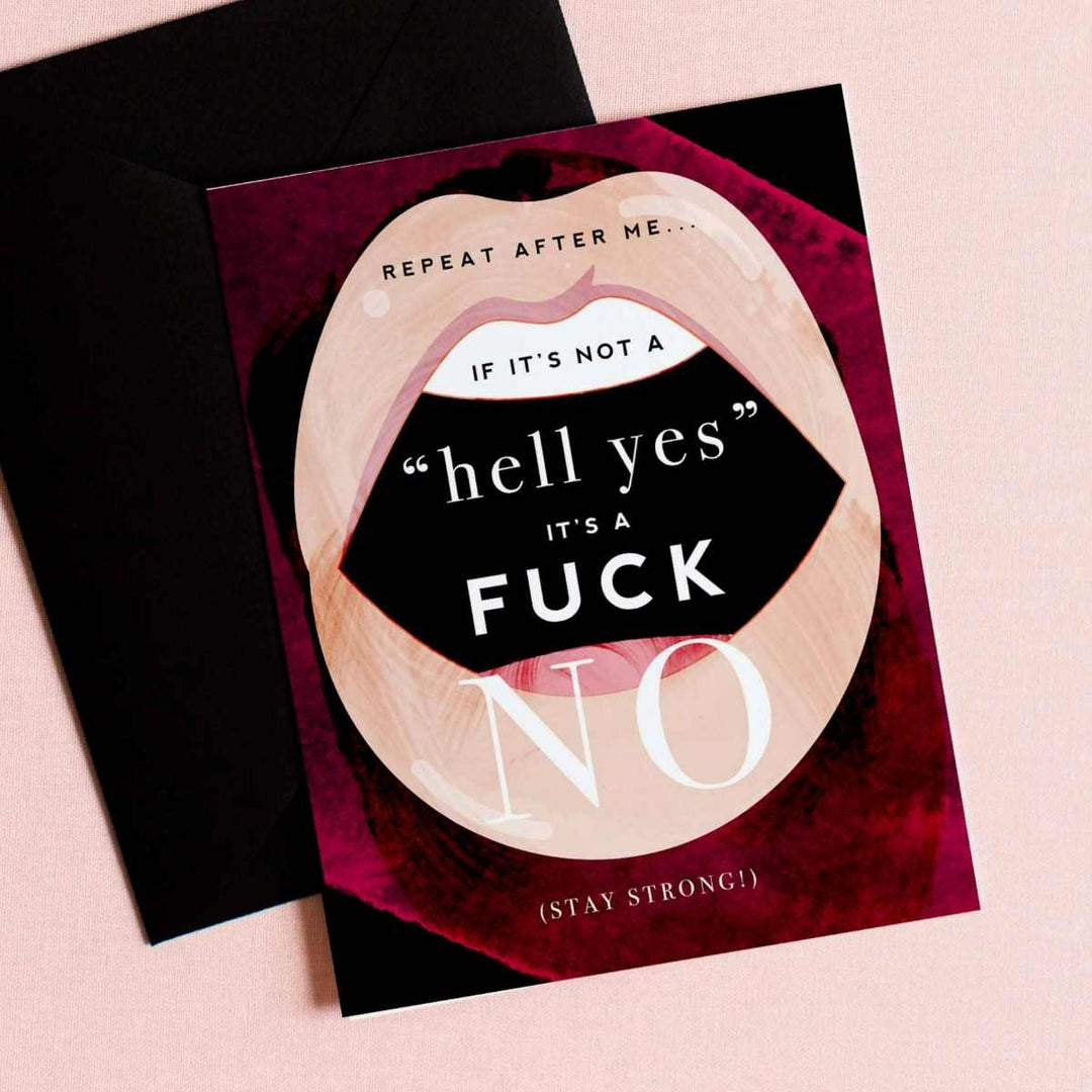 A red, black, and cream card with illustrated lips saying "repeat after me... If it's not a "hell yes" It's a fuck NO (stay strong)". Comes with a black envelope.