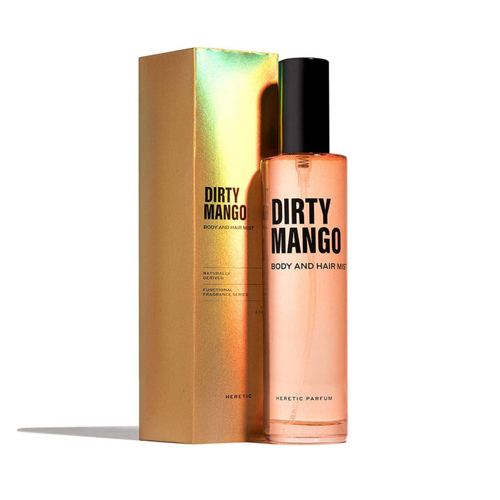 Heretic Parfum | Dirty Mango body and hair mist with packaging on a white background