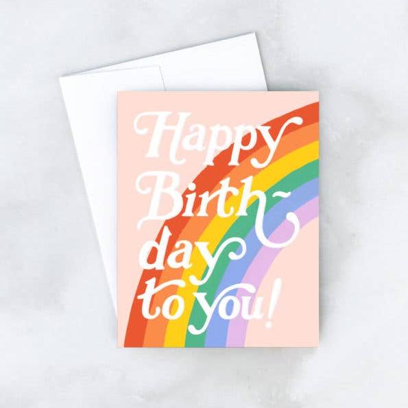 Idlewild Co. | Big Rainbow Card | A light pink card with rainbow and text "Happy Birthday to You!".