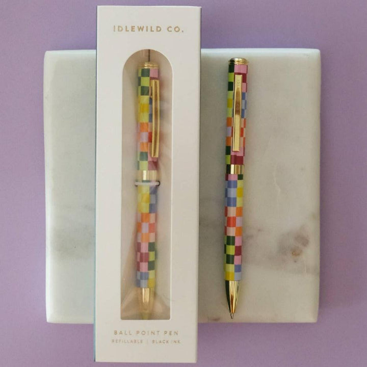 Idlewild Co. | Checkered pen with gold accents.