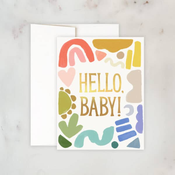 Idlewild Co. | Baby Shapes Card | A rainbow colored card with shapes and gold text that reads "Hello, Baby!".