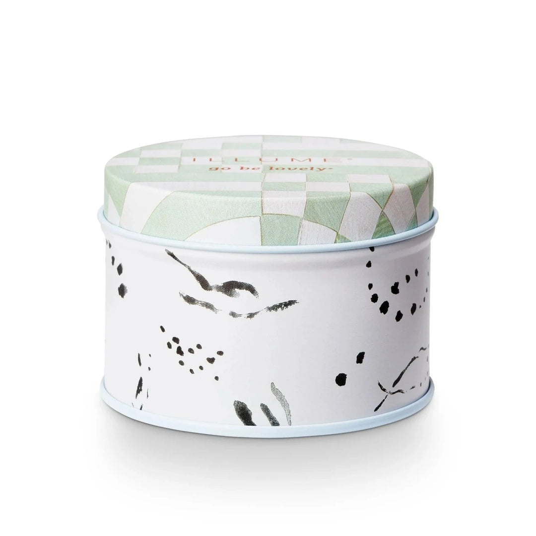 Illume | Summer Vine Fleur Tin Candle | A tin candle container with a checkered green lid and abstract patterned base.