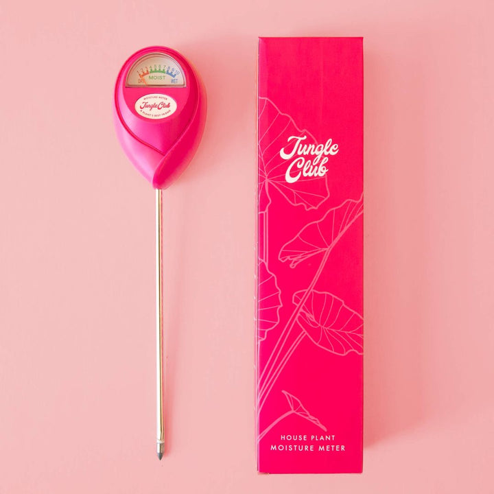 Jungle Care | Moisture Meter | Hibiscus | A hibiscus pink moisture meter next to the pink moisture meter box that reads "Jungle Club".