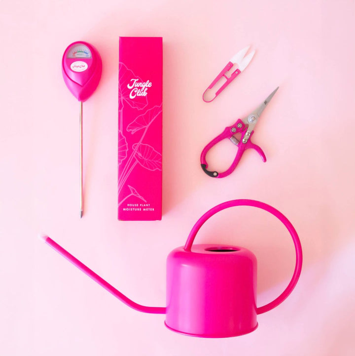 Jungle Club | Moisture Meter, box, snips, pruning shears, and watering can. All in the hibiscus pink.