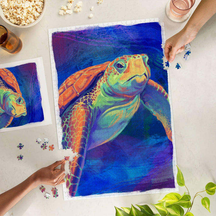 Colorful turtle puzzle being completed on a table with popcorn and a drink.