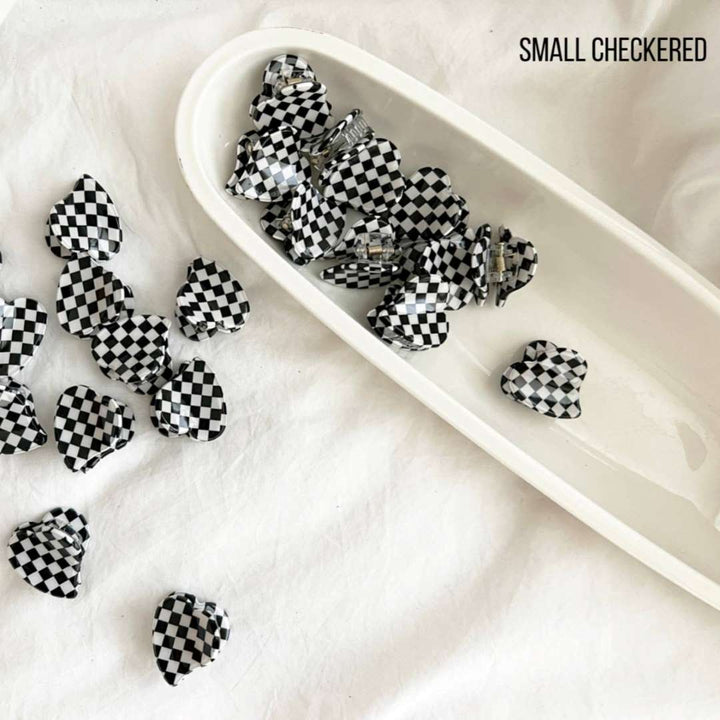 LoveLina | Heart Shape Acetate Hair Clip - DOLCE | A black and white checkered heart shaped hair clip.