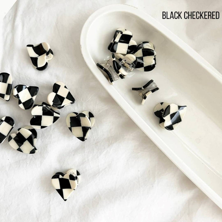 LoveLina | Heart Shape Acetate Hair Clip - DOLCE | A white and black checkered heart clip.