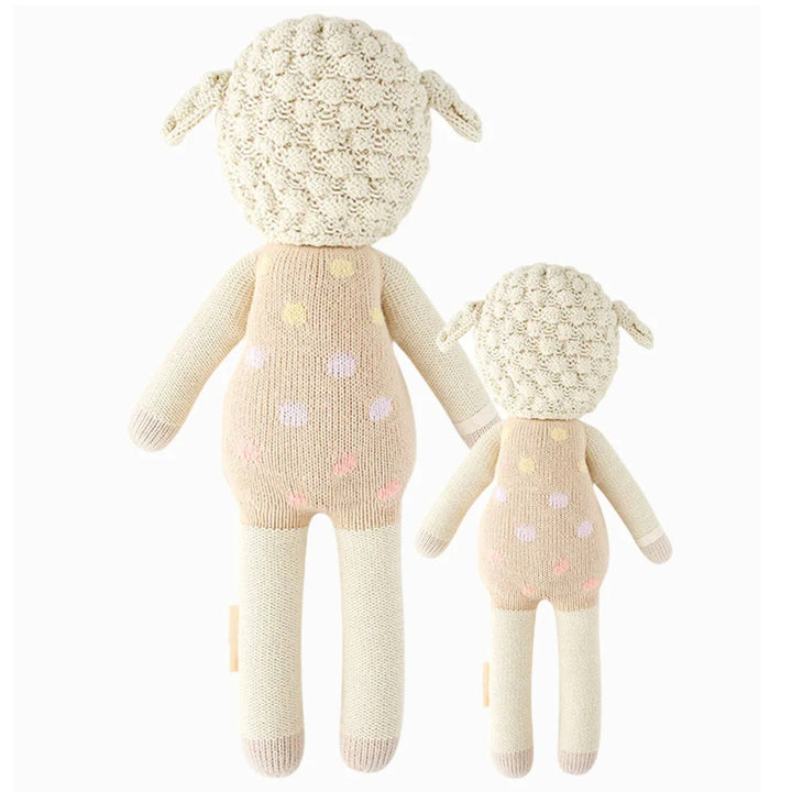 Lucy The Lamb | Cuddle + Kind | Reverse side of the hand knit lamb plushie.
