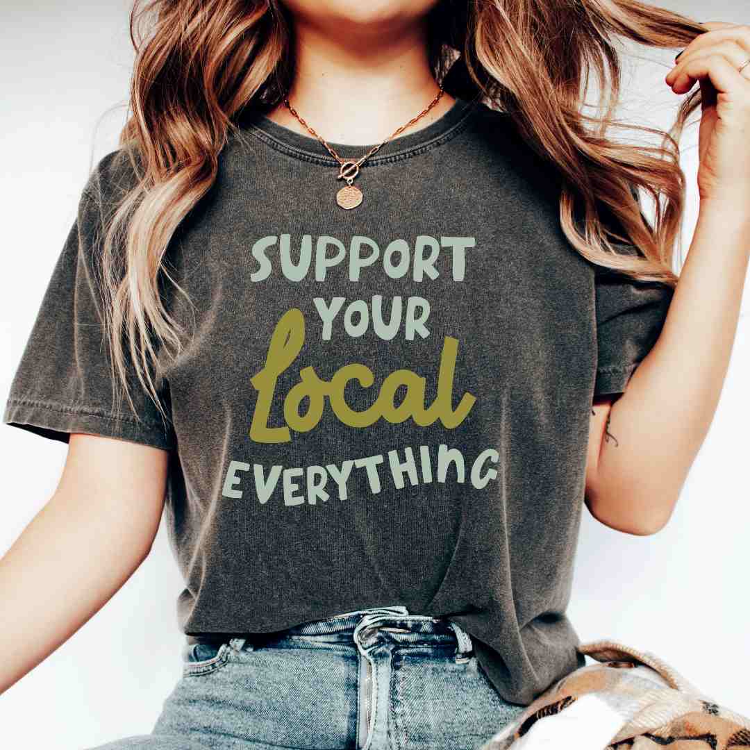 Mugsby | Support Your Local Everything Tee | A gray comfort colors tshirt with text.
