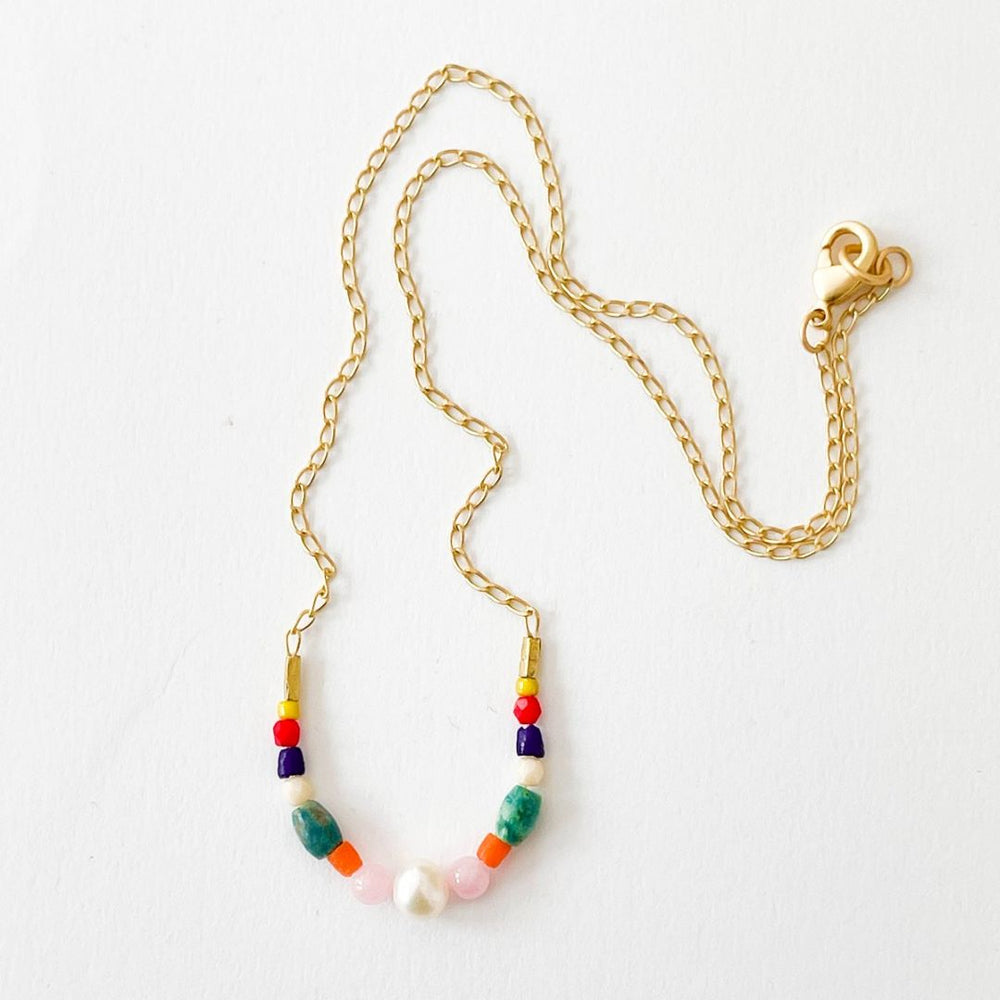 Nest Pretty Things | Dainty Red Bead and Turquoise Pearl Necklace | A gold chain with colorful beads.