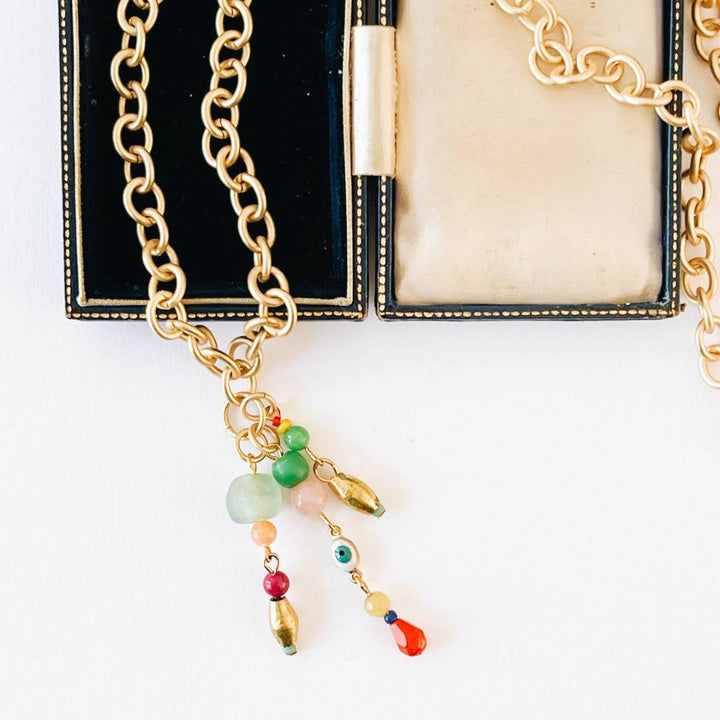 Thick Gold Chain Charm Necklace With Beads: 16" | Nest Pretty Things | Close up on the gold chain and colorfully beaded pendant.