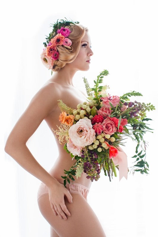 Floral Boudoir images with bouquet of flowers