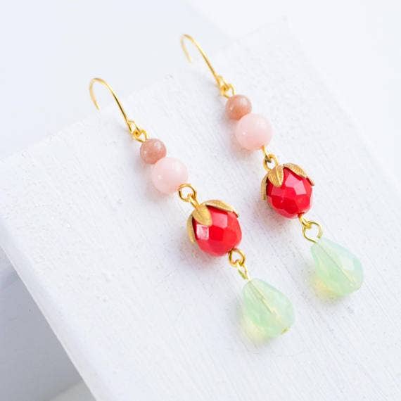 Nest Pretty Things | Pair of earrings with red, pink, and green beads on a white background. Gemstone and Glass.