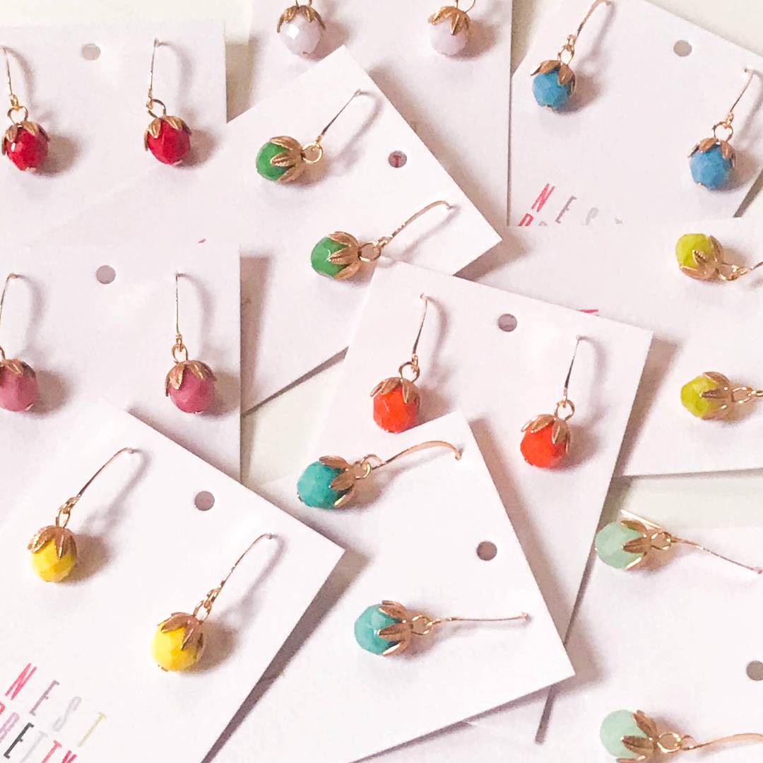 Nest Pretty Things | Colorful earrings on white cards with a light background