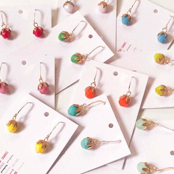 Nest Pretty Things | Colorful earrings on white cards with a light background