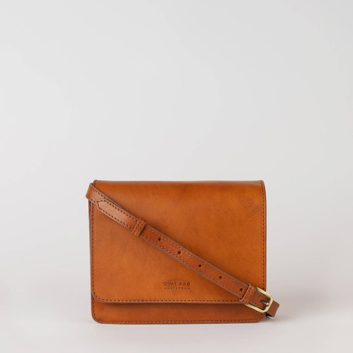 O My Bag | Audrey Mini | Cognac brown leather with a thin leather strap.