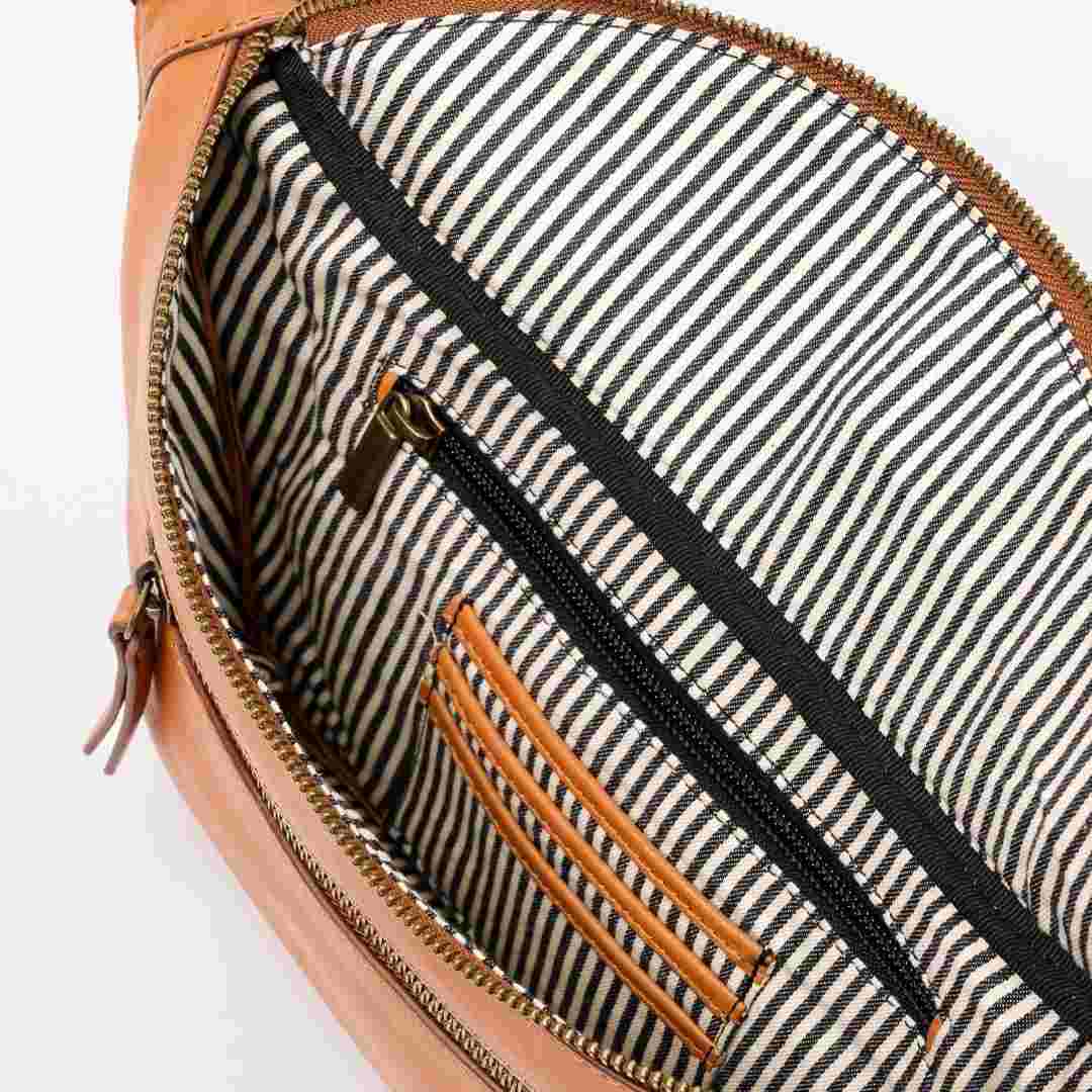 O My Bag | Bum Bag | Wild Oak Soft Grain, brown leather. Cotton interior is black and white striped.