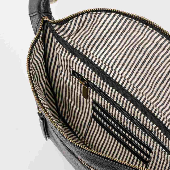 O My Bag | Drew Crossbody Bag, black leather with a cotton black and white striped interior.