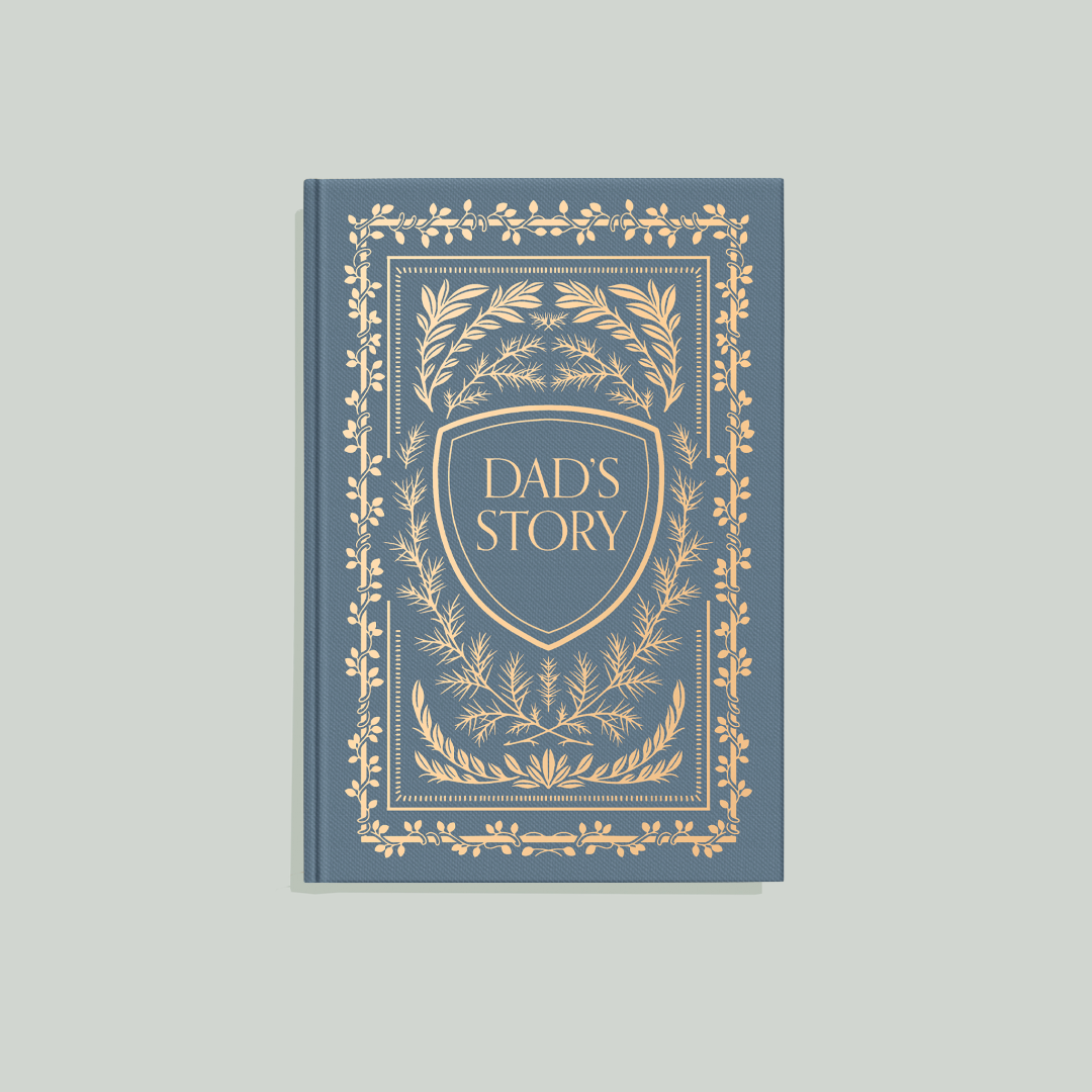 Book titled 'Dad's Story' with decorative cover on a light gray background
